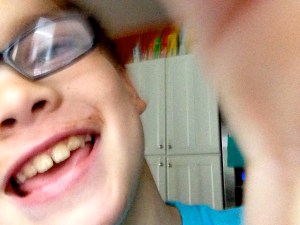 The chocolate mustache tells the tale.